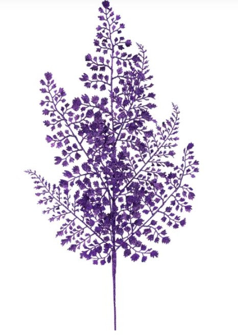 A stylized purple tree with intricate leaf patterns and branches.