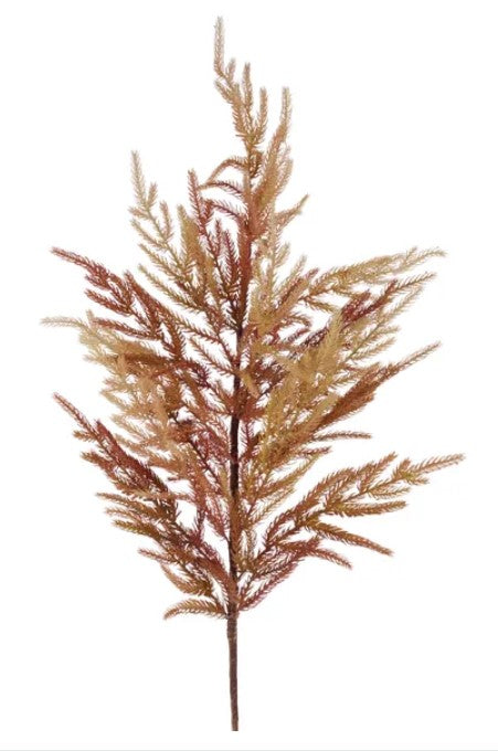 a branch with brown and tan leaves, creating a visually appealing and natural-looking plant.