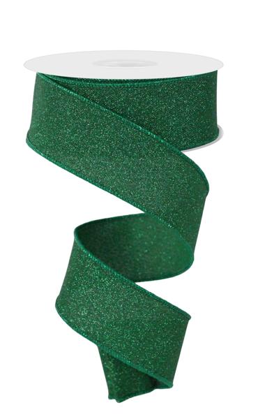 a roll of green glitter ribbon on a white background