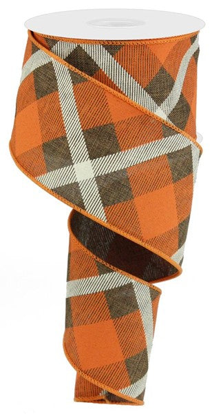 a roll of orange and brown plaid ribbon