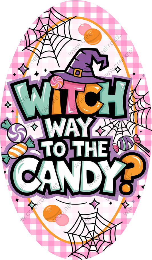 a sign that says witch way to the candy