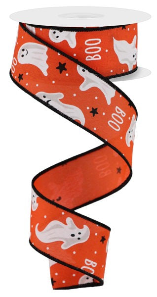 a roll of halloween ribbon with ghost and ghost faces on it