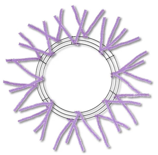 A circular wreath made of purple pipe cleaners arranged in a radial pattern.