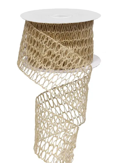a spool of beige, knitted or crocheted ribbon or cord with a spiral pattern.