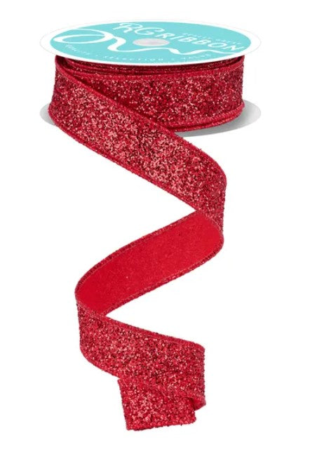 A roll of red glittery ribbon with a spiral pattern.