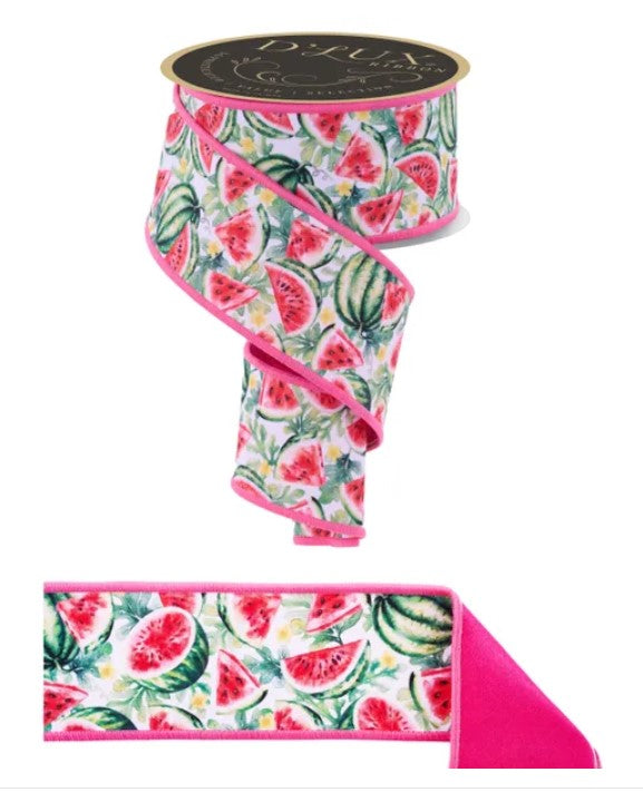 a decorative ribbon with a watermelon pattern. The ribbon is pink and has a black label on it.