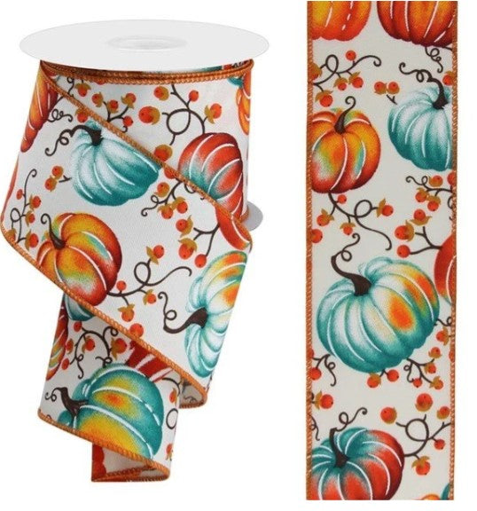 a white ribbon with a pumpkin and leaf pattern printed on it.