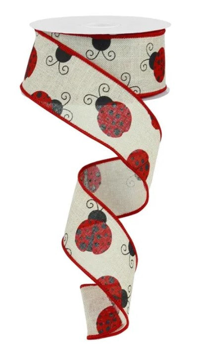 A beige and red ribbon with a repeating pattern of red ladybug designs.