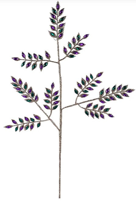 A decorative branch with purple and green leaves, possibly made of glitter or other embellishments.