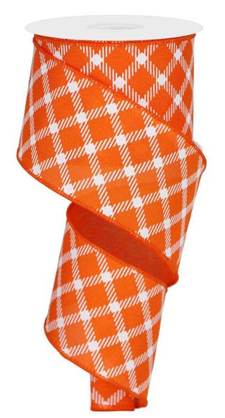 a roll of orange and white plaid ribbon