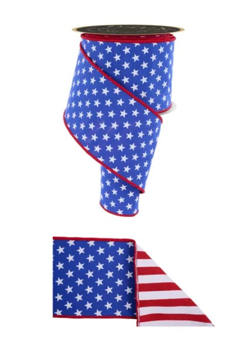 a large blue and red ribbon with white stars, resembling an American flag. The ribbon is coiled and appears to be a decorative piece.