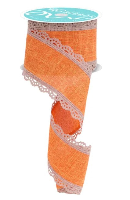 a roll of orange fabric with a lace-like trim, which appears to be a decorative item.
