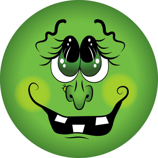 a green face with big eyes and a smile