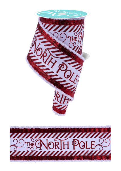 A red and white Christmas-themed ribbon with the text "The North Pole" printed on it.