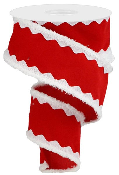 a roll of red and white christmas ribbon