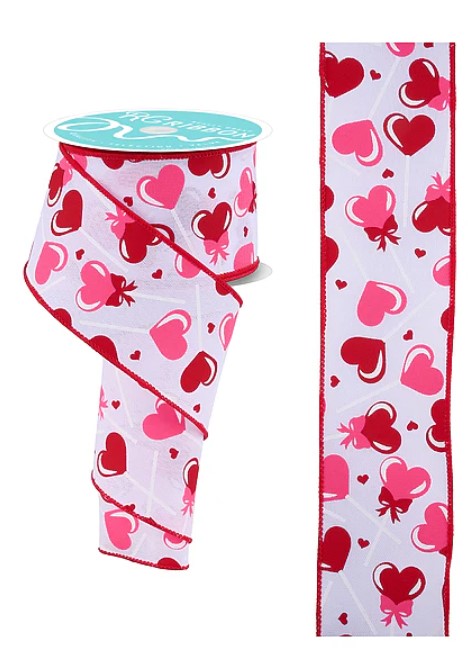 a ribbon with a heart pattern, including red and pink hearts and lollipops.