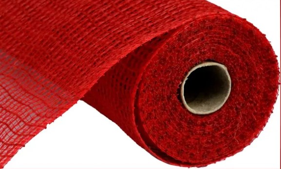 A roll of red, textured fabric or material with a white center hole.
