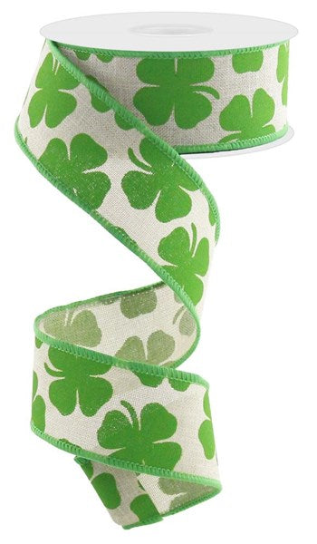 a green and white ribbon with shamrocks on it