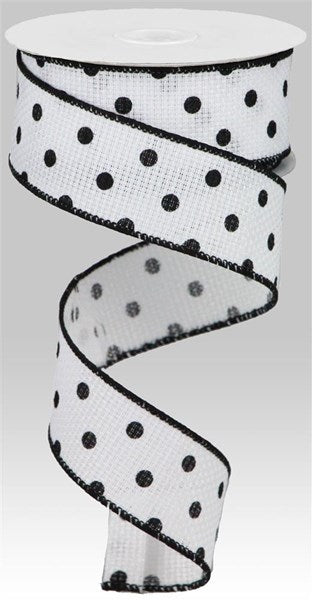 a white and black polka dot ribbon with black dots