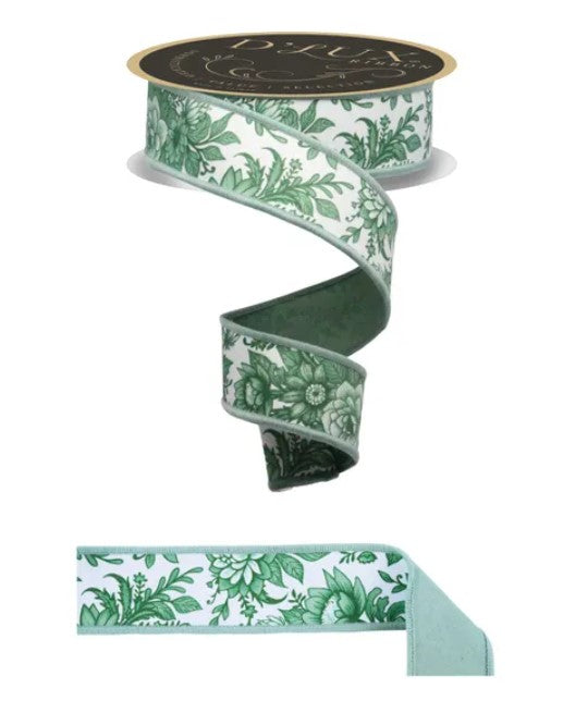 a decorative floral pattern on a ribbon, with a black and gold label on top of it.