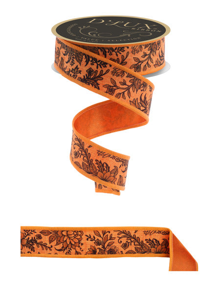 a decorative orange ribbon with a floral pattern.