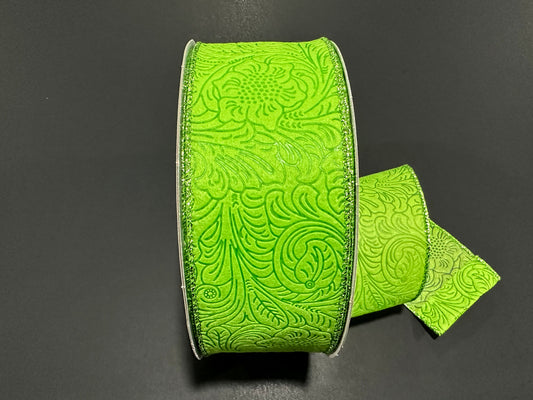 a green ribbon with a design on it