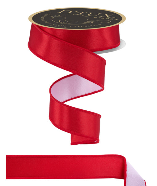 a red ribbon with a gold medal on top of it