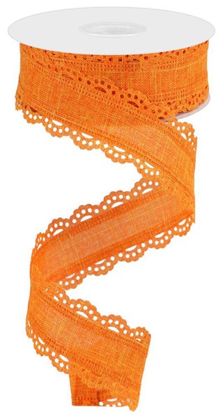 a roll of orange ribbon on a white background