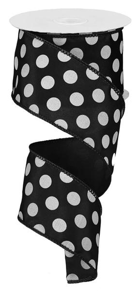 a roll of black and white polka dot ribbon