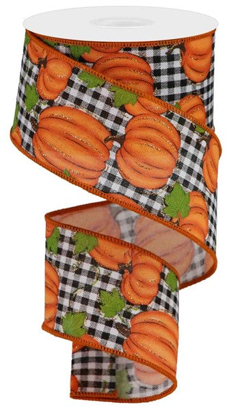 a roll of ribbon with pumpkins on it