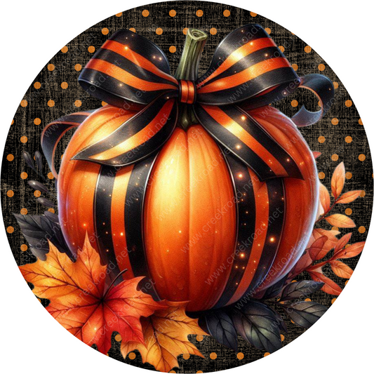 a painting of a pumpkin with a bow on it