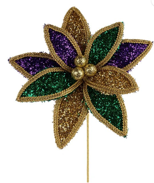 A decorative flower-shaped ornament with a gold and purple color scheme, featuring a gold center and green leaves.
