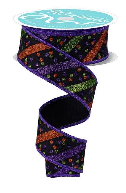 a spiral-shaped ribbon with a black and purple pattern, including orange and green polka dots.