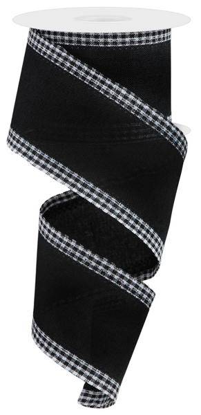 a roll of black and white plaid ribbon