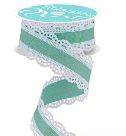 A turquoise and white ribbon with a scalloped edge and lace-like trim.