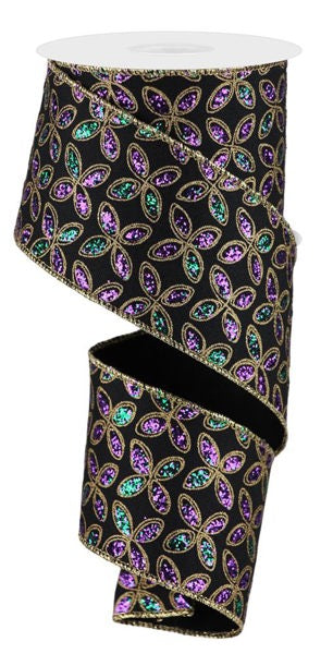 a black ribbon with purple and green sequins