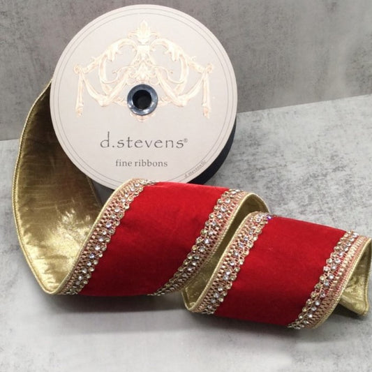 A roll of red velvet ribbon with gold trim and rhinestones, along with a white label that reads "d.stevens fine ribbons".