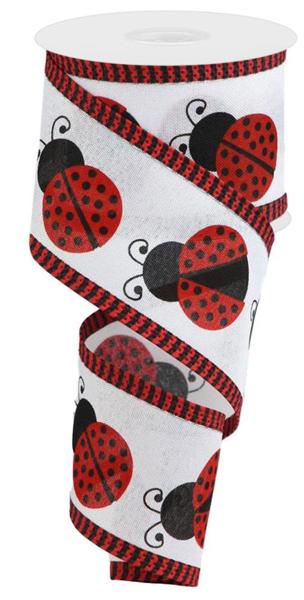 a roll of ribbon with ladybugs on it