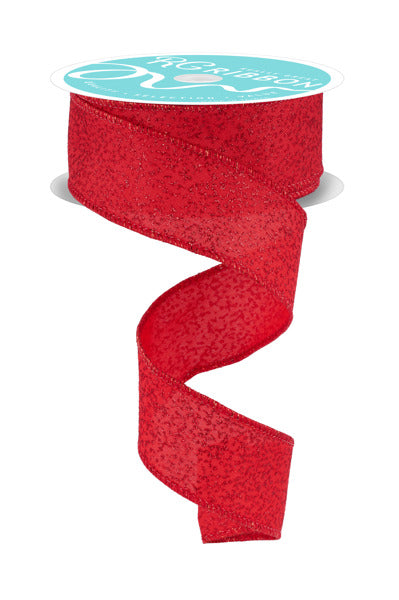 A roll of red glittery ribbon with a turquoise label.