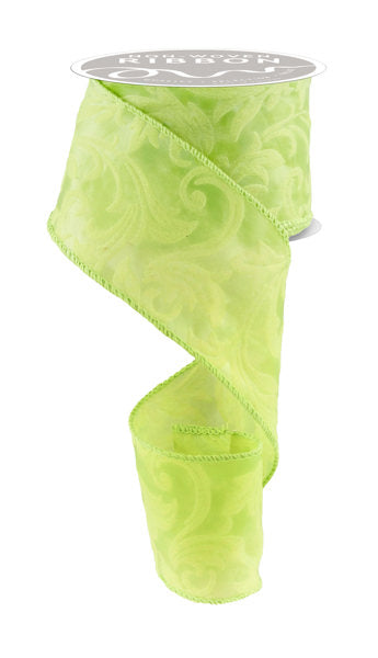 a roll of neon green ribbon with white swirls