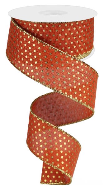 a red ribbon with gold dots on it