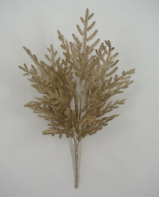 A golden, leafy branch with intricate, overlapping branches is displayed against a plain white background.