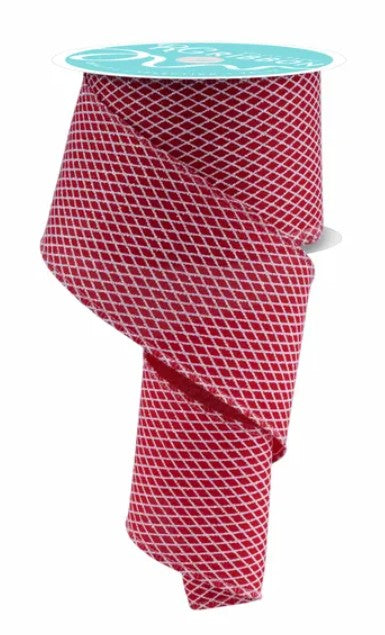 a red and white checkered patterned fabric, possibly a ribbon, with a turquoise circular label attached to it.