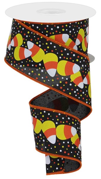 a roll of black and orange polka dot ribbon