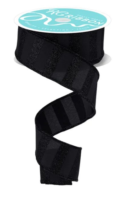 a black ribbon with a spiral pattern, which is a decorative item.