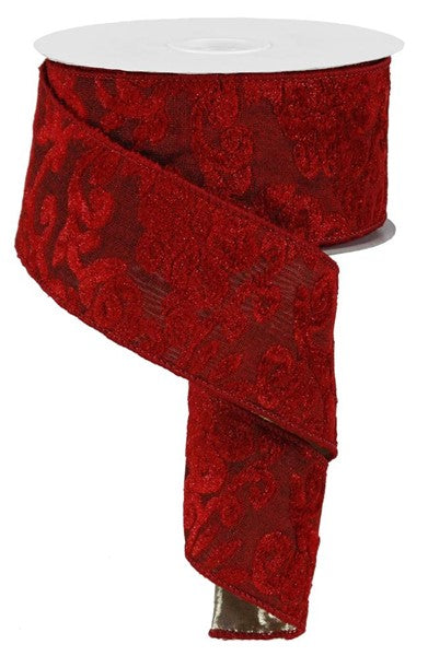 a roll of red floral-patterned ribbon.