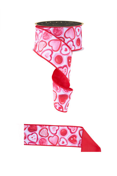 a pink and red ribbon with hearts on it