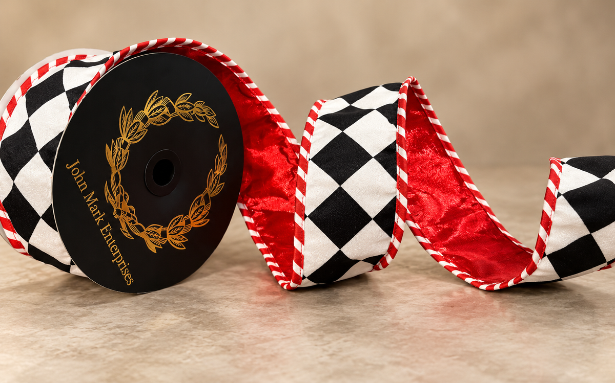A black and white checkered ribbon with red trim is displayed on a beige surface.