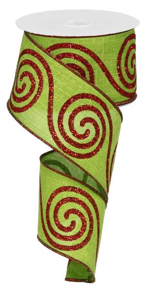 a green ribbon with red swirls on it