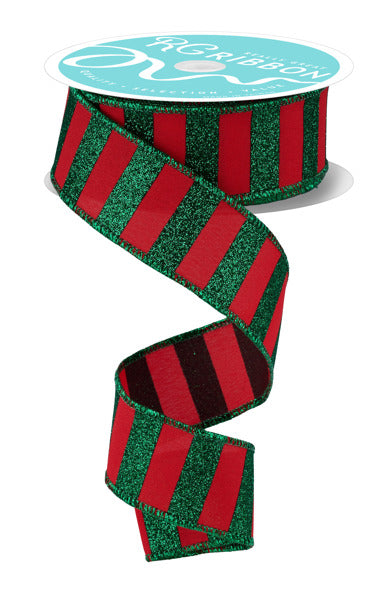 A red and green striped ribbon with a glittery texture, sitting on a white surface.